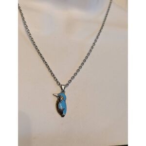 Silver toned blue bird pendant necklace